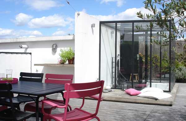 Transformation d'un toit en terrasse végétalisée style Loft par un architece paysagiste à Marseille